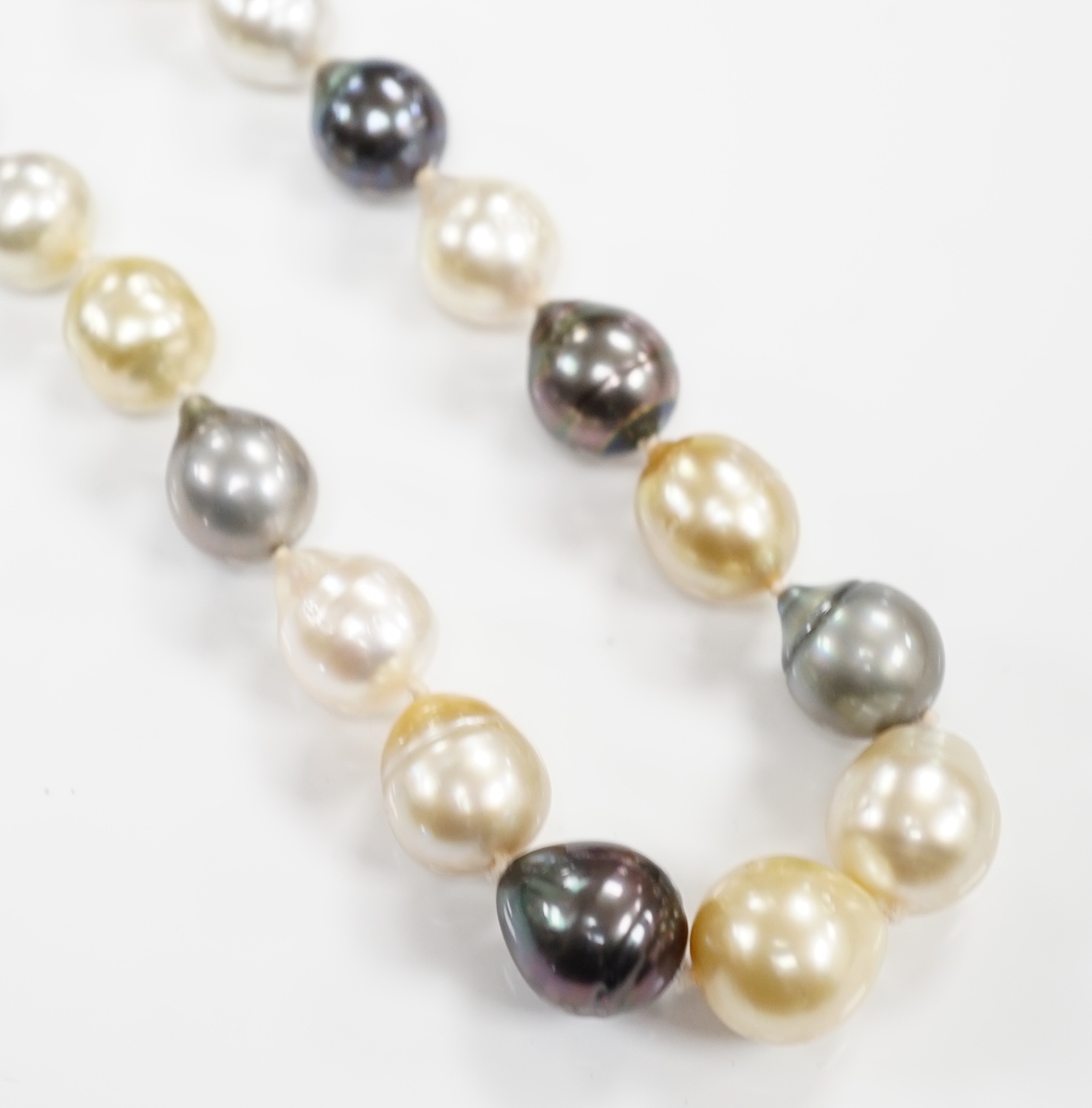 A modern single strand cultured South Sea cultured baroque pearl necklace, with 18ct gold spherical clasp, 42cm, with box.